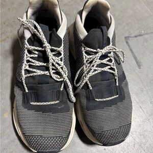 On Running Black and White Sneakers with Cushioned Sole